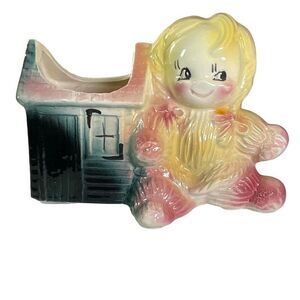 Vintage ceramic American Bisque Yarn Doll planter.